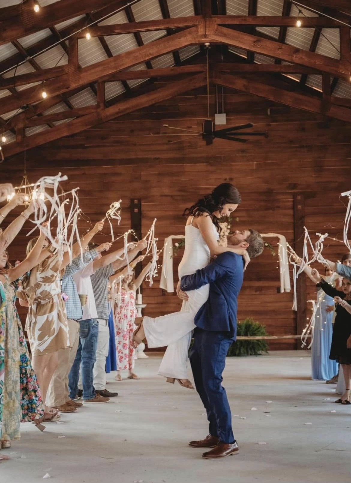 Couple celebrating with sparklers.