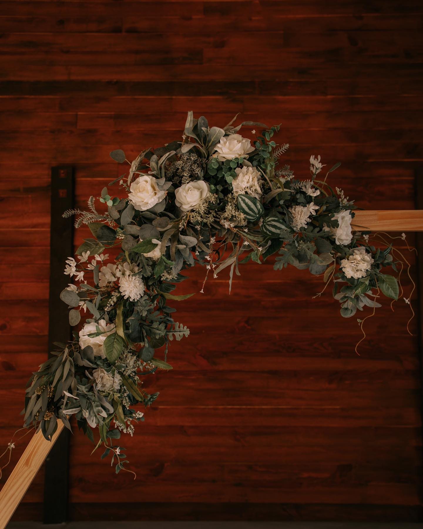Florals against warm barn wood.