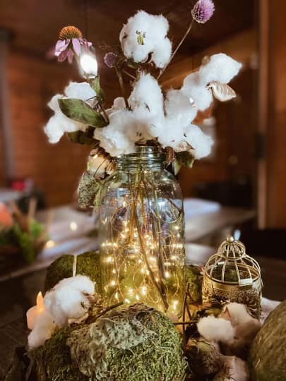 Rustic floral detail glowing inside the barn.