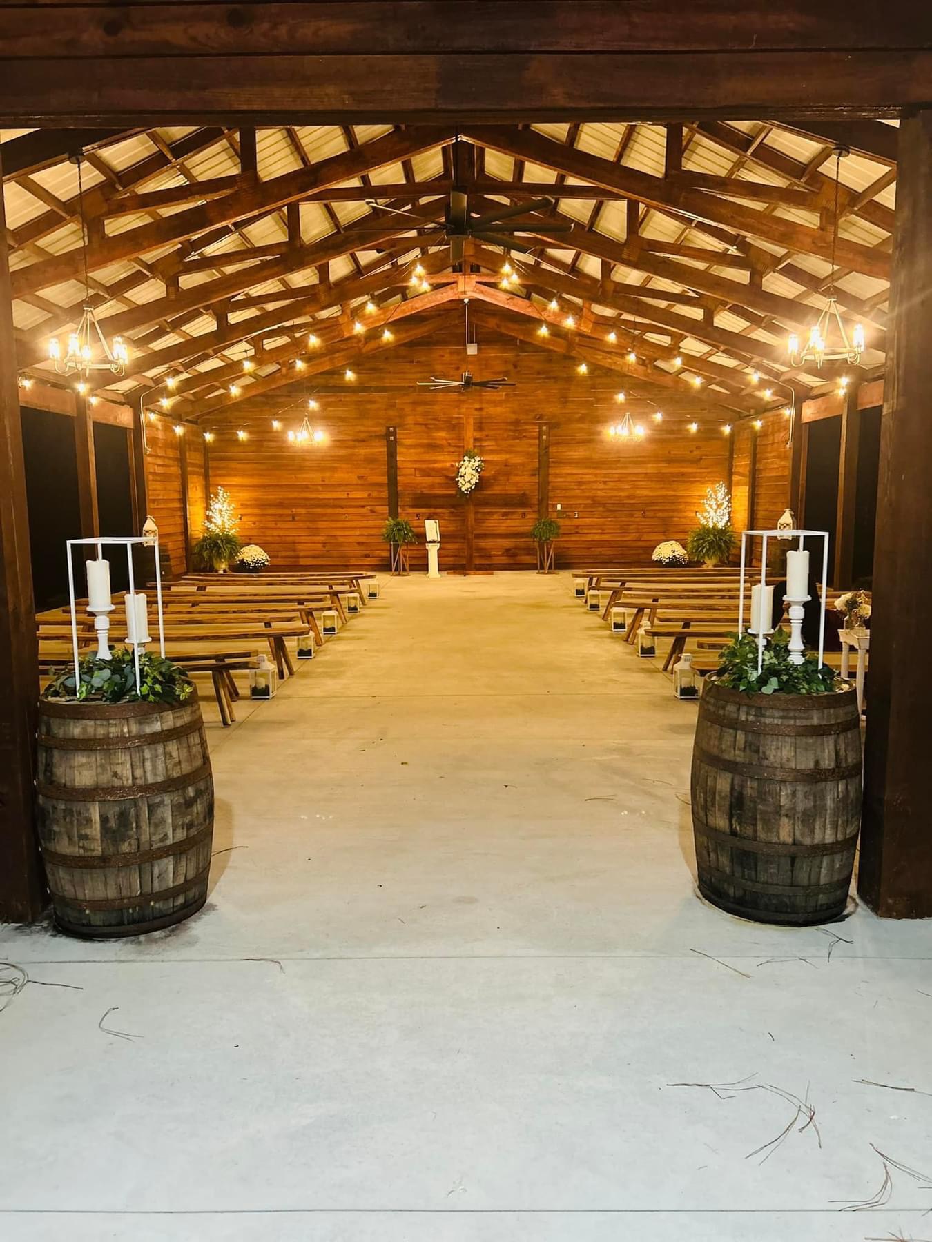 Covered pavilion arranged for a warm ceremony at The Horse Barn.