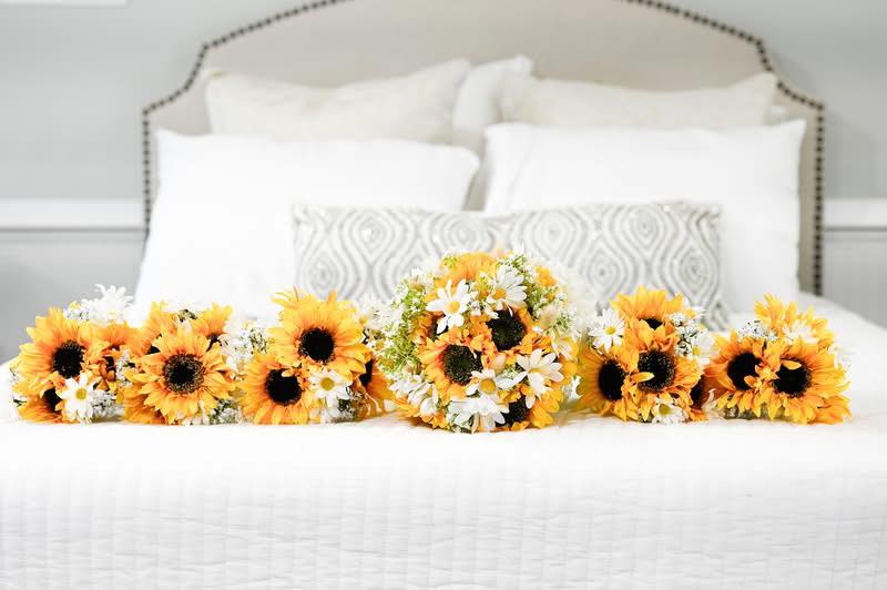 Sunflower florals in a bright bridal suite.