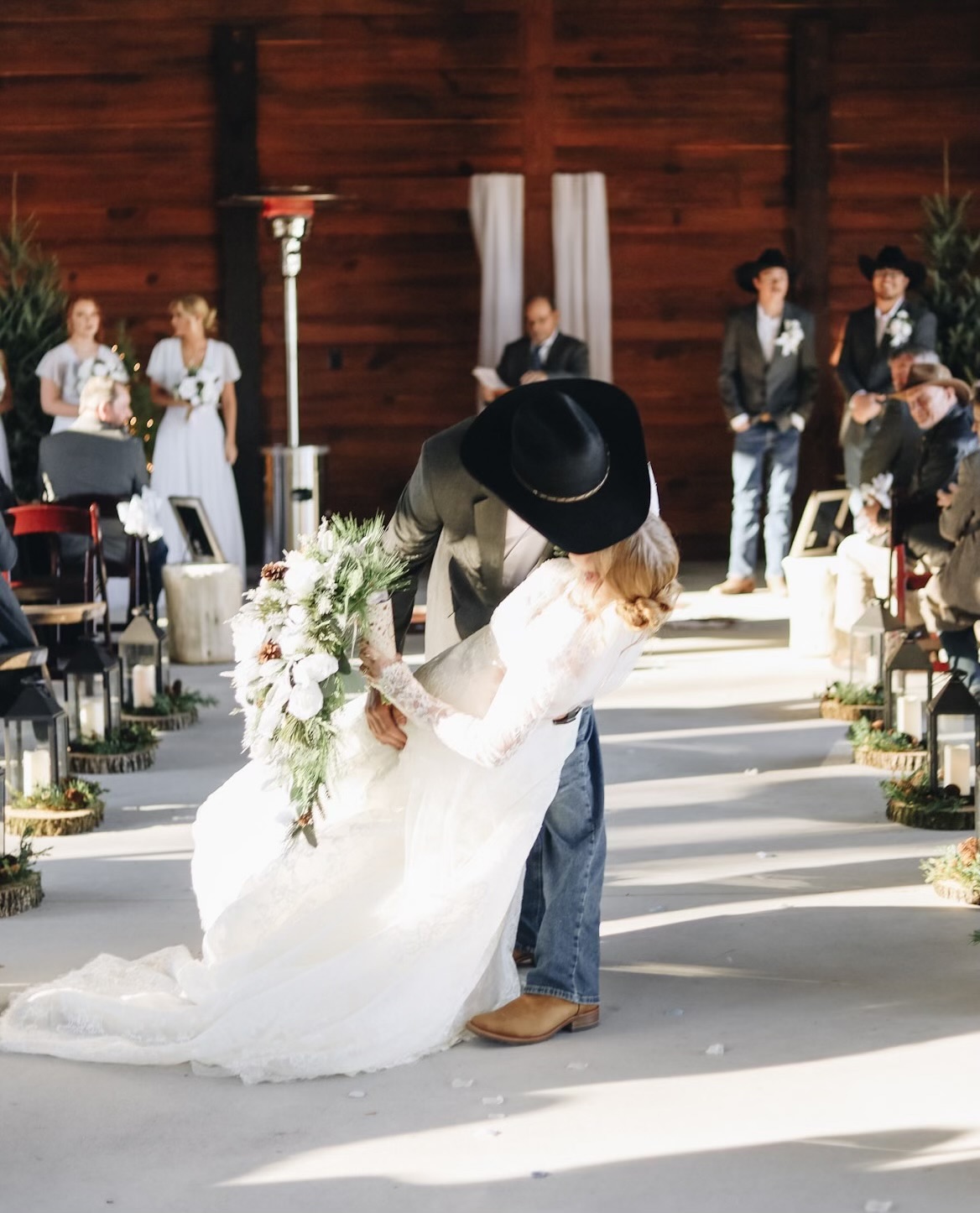 Bride and groom sharing a ceremony moment in the covered pavilion.